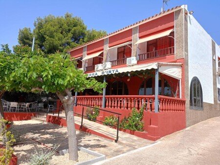 Hotel con jardín